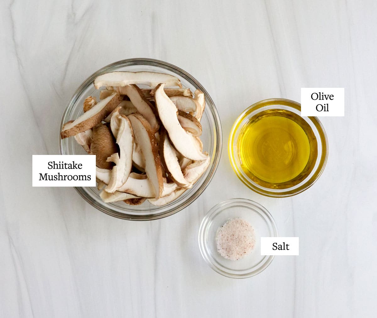 mushroom bacon ingredients labeled in glass bowls.